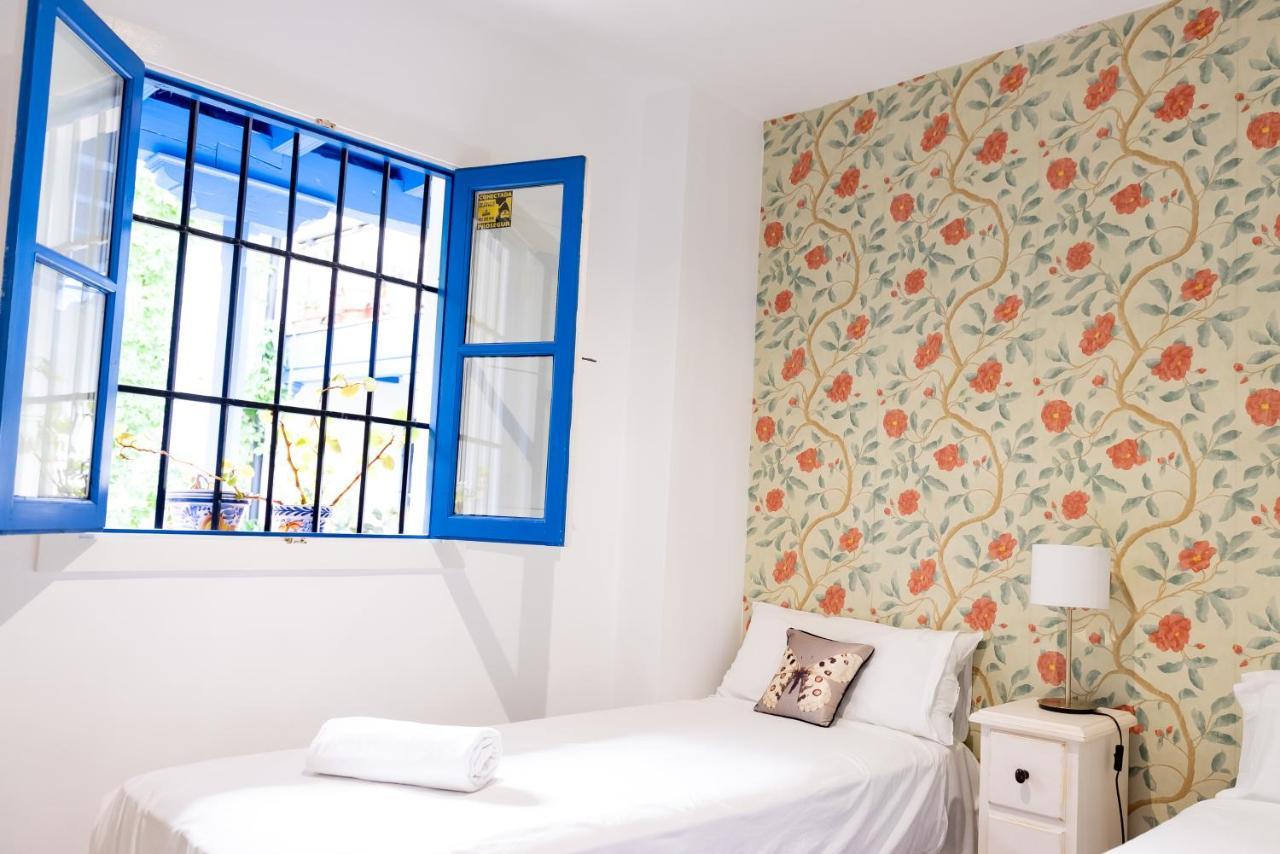 Tourist House Santa Cruz Apartment Sevilla Bagian luar foto